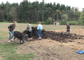 Students working in the community garden