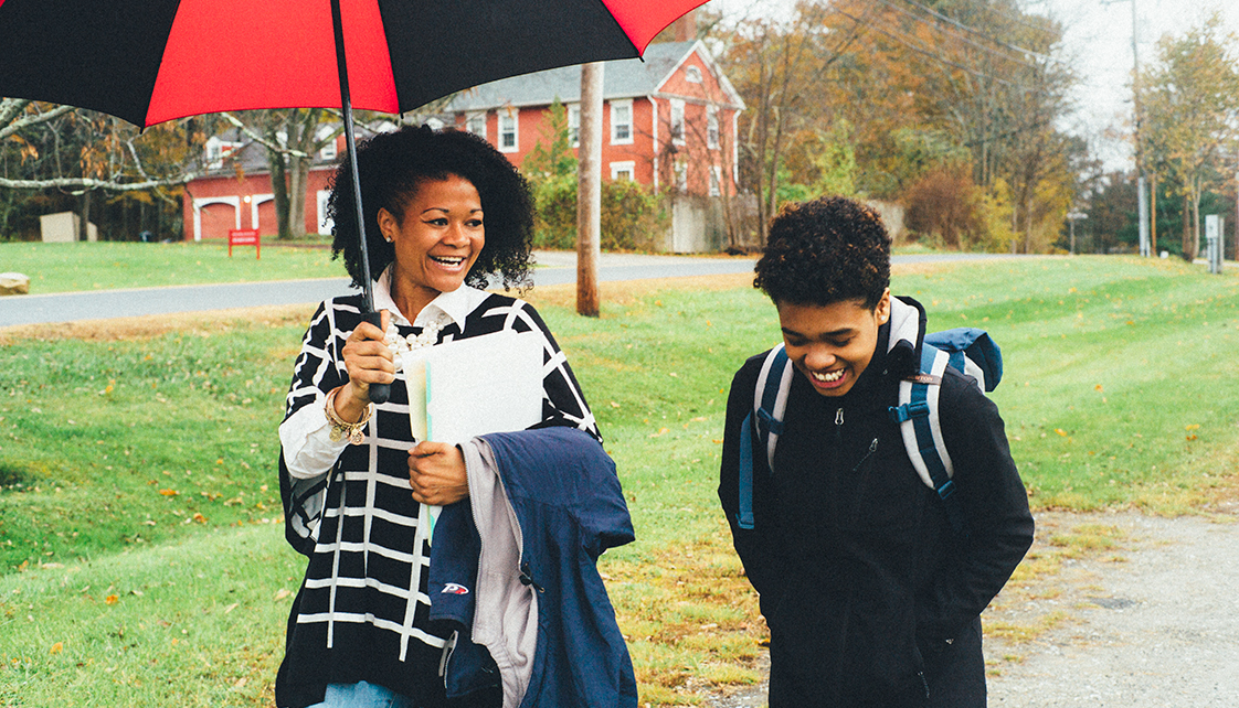 college students walking side