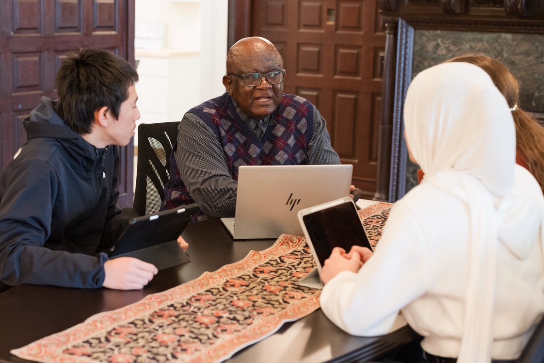 Advisor meeting with students
