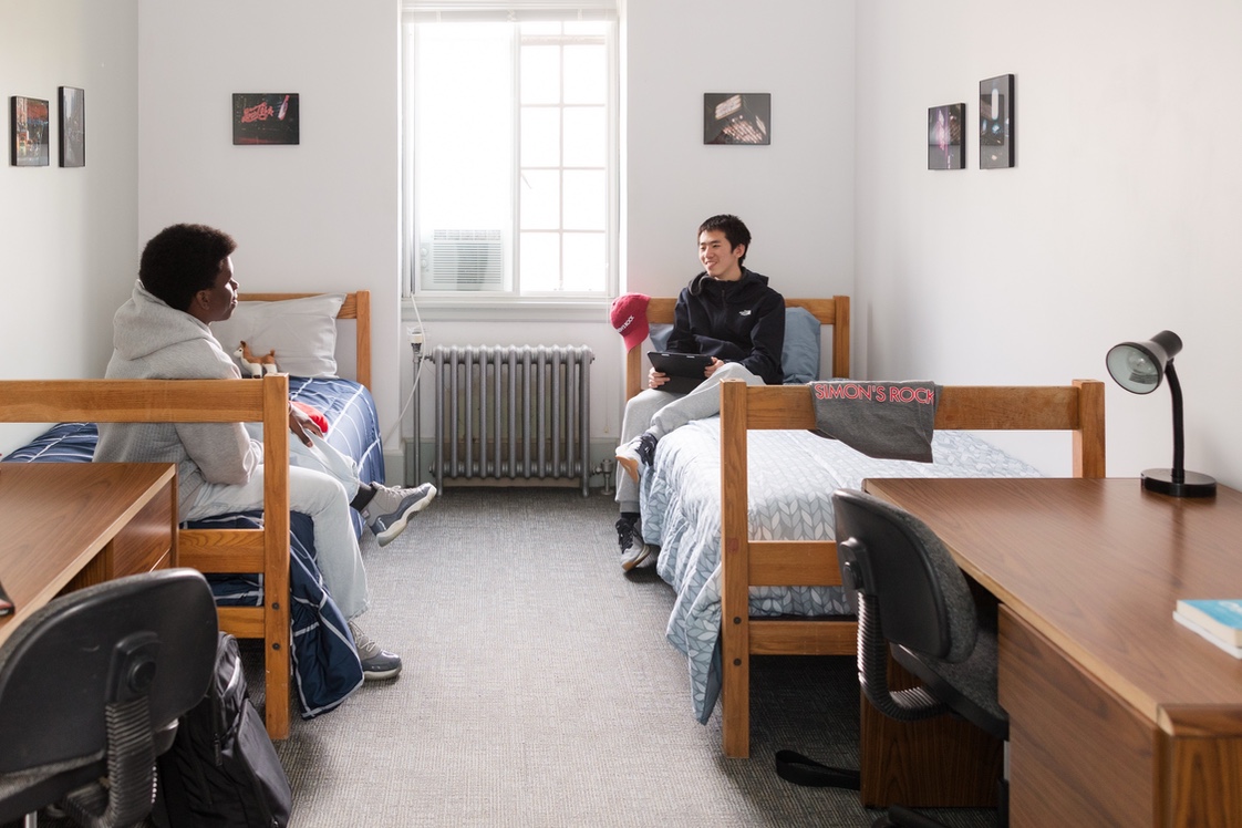 Two male students in dorm room