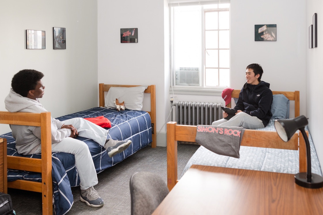 Two male students in dorm room