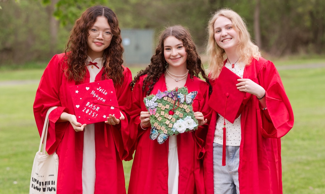 Three female students at matriculation