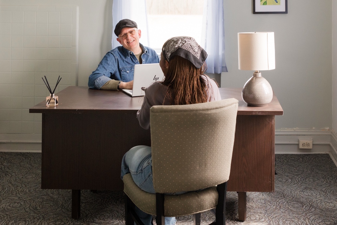 Advisor talking to student