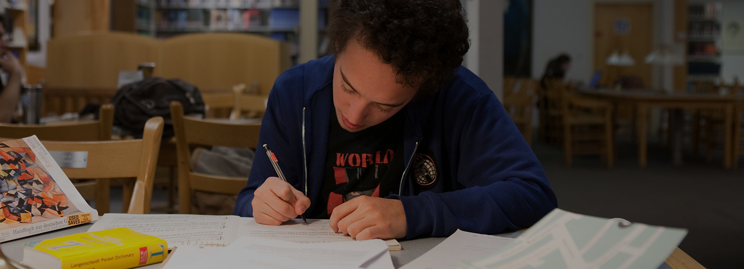 Student doing research in library