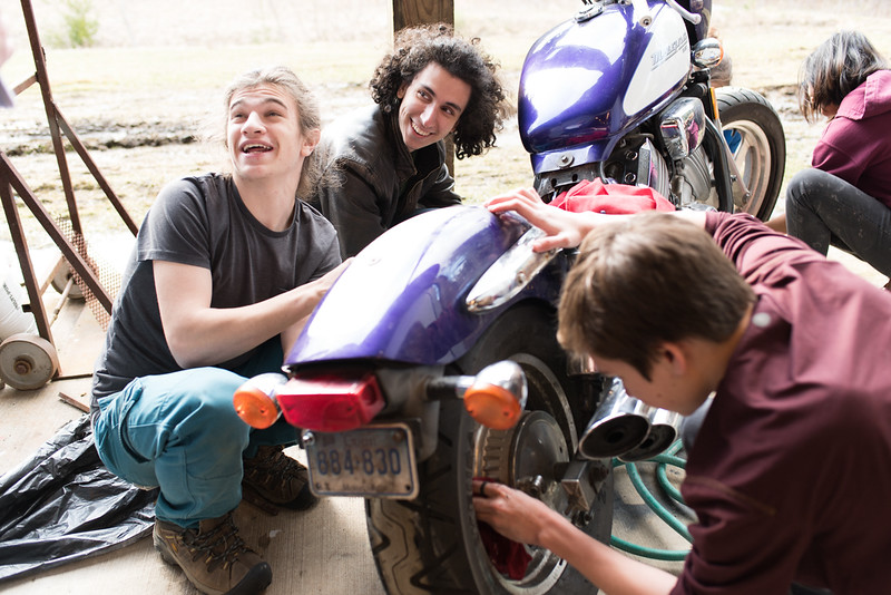 students and faculty in motorcycle club