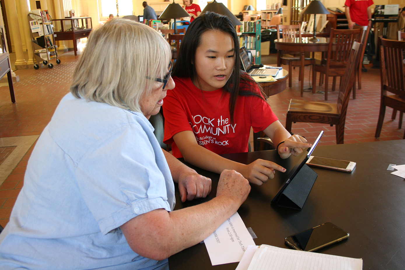 Simon's Rock student, Nancy Wen, volunteers at Mason Library for Rock the Community