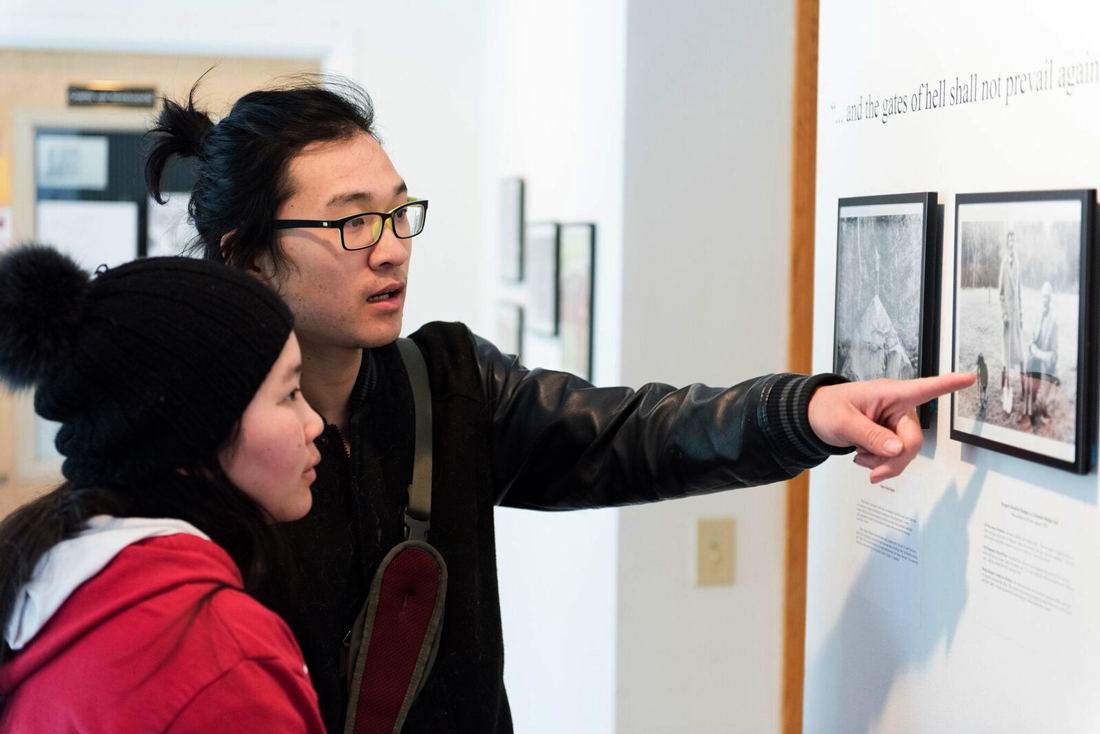 James Lam '13 and Yueming Chen '13 viewing the exhibition.