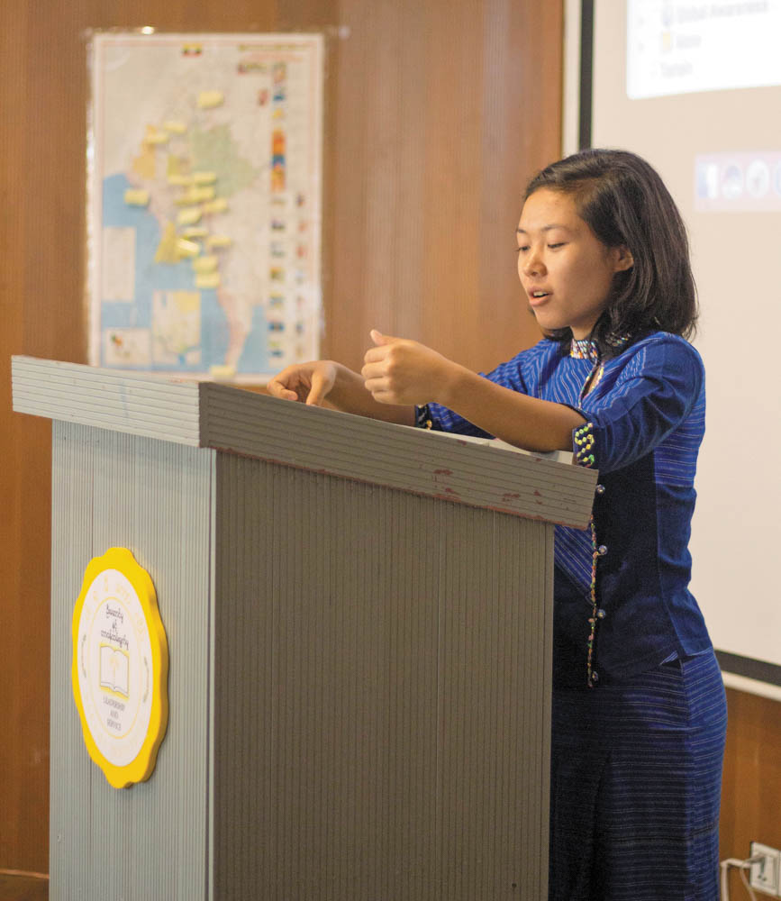 Speaking at podium